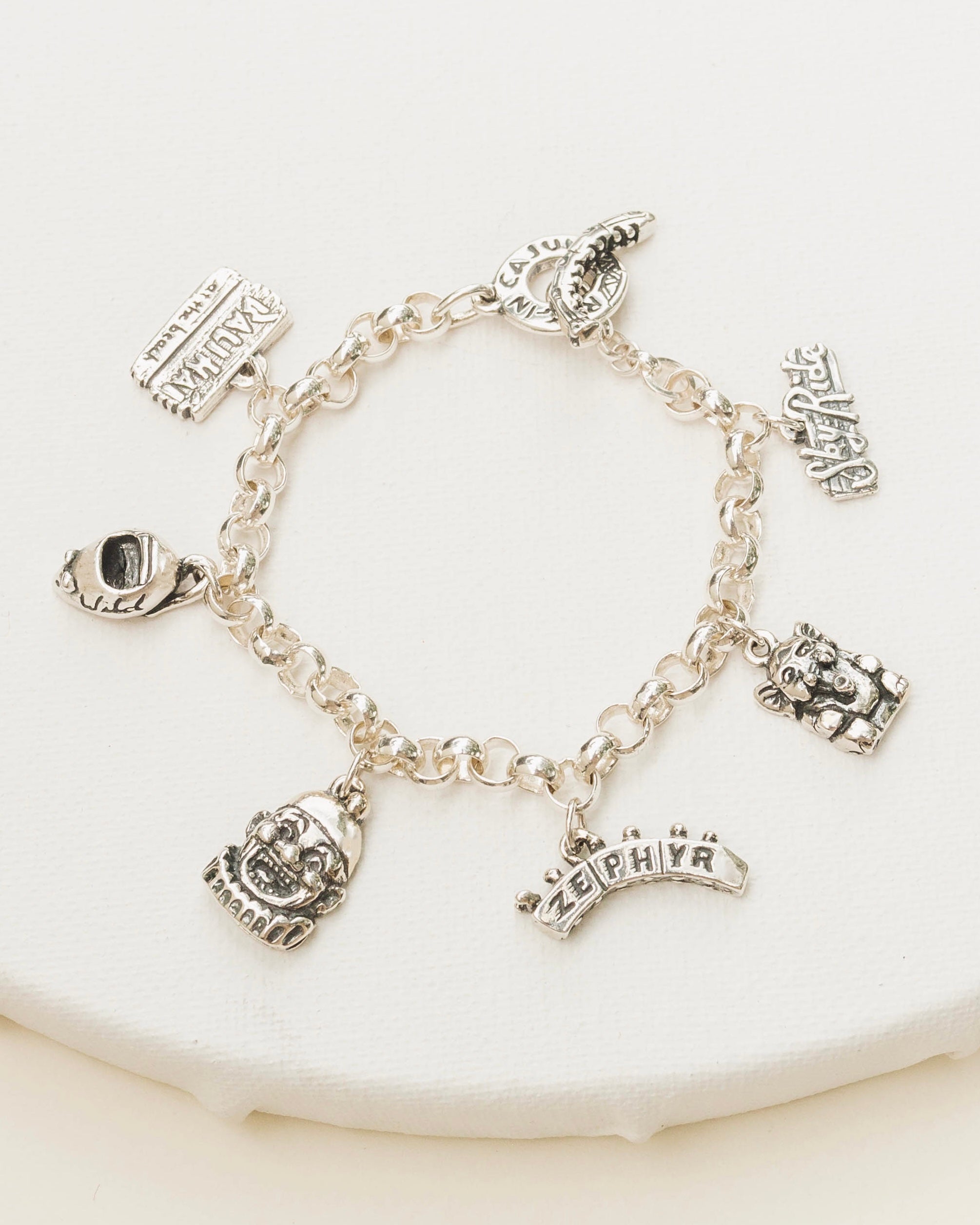 loteria bracelet  Charm bracelet, Jewelry inspiration, Jewelry