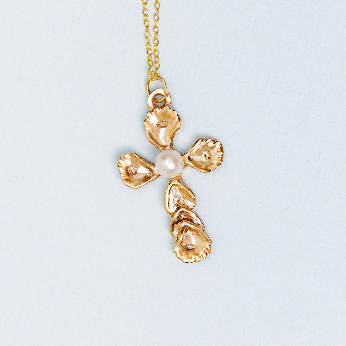 Bronze Oyster Cross Pendant