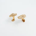 Handcrafted gilded bronze alligator cufflinks inspired by Louisiana bayous.