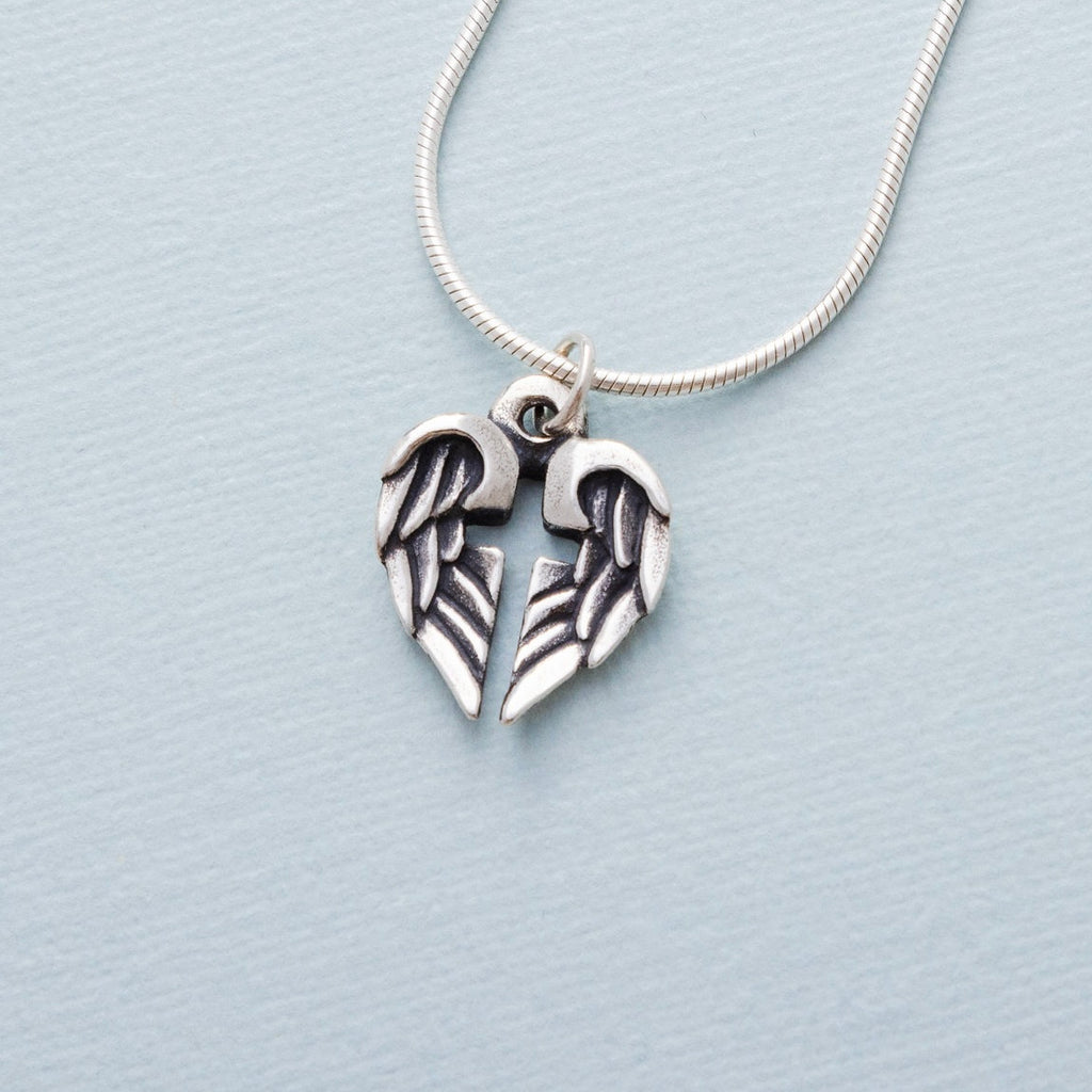 angel wing cross pendant in sterling silver necklace