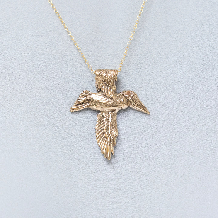 Bronze Pelican Cross Pendant