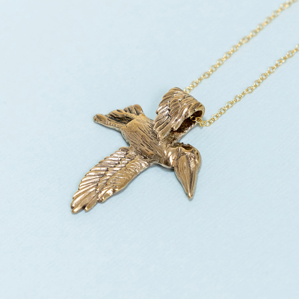 Bronze Pelican Cross Pendant