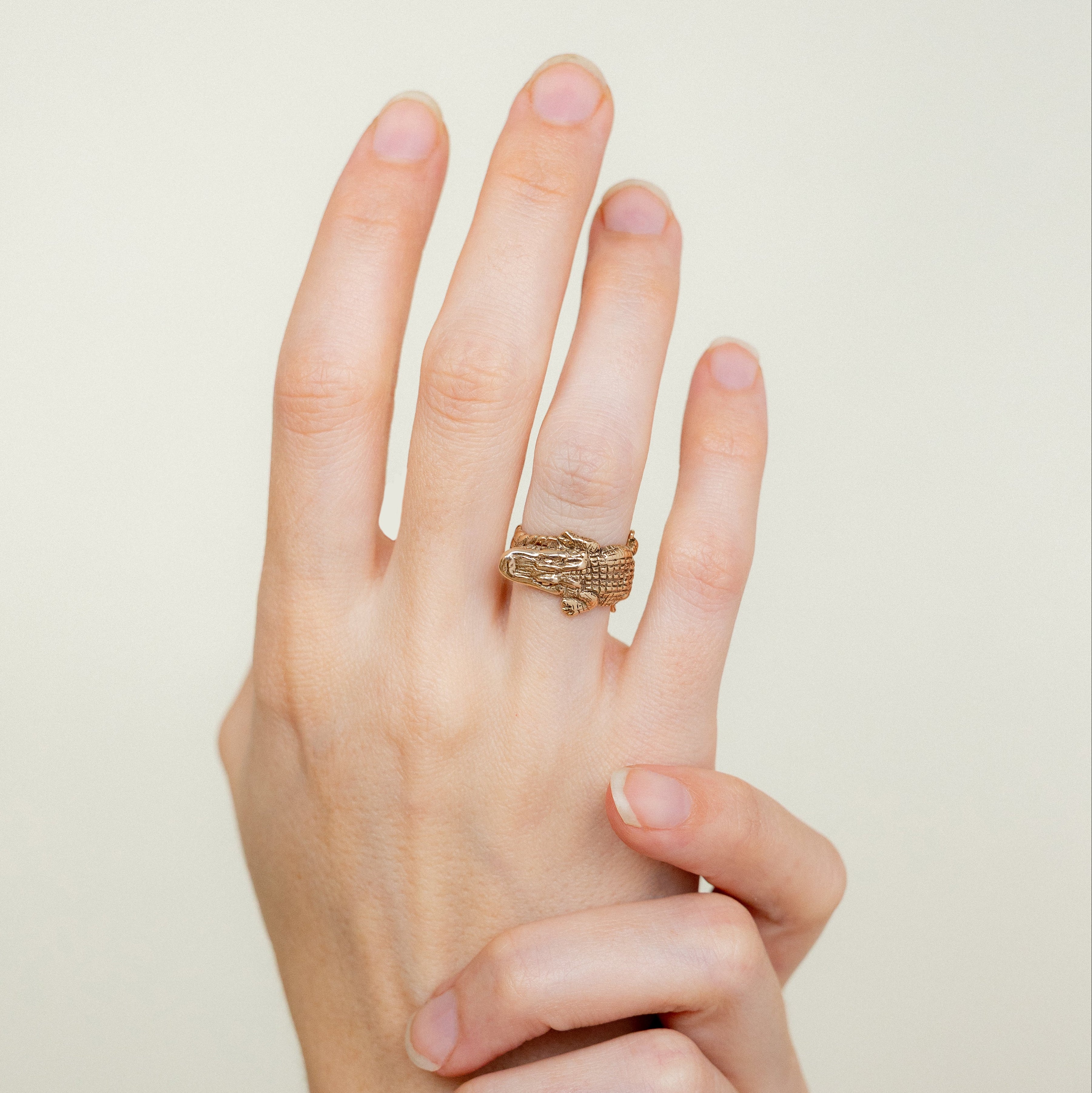 bronze alligator ring worn on finger bold statement jewelry for women