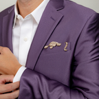 Purple blazer with a gold tiger pocket square on a neutral background