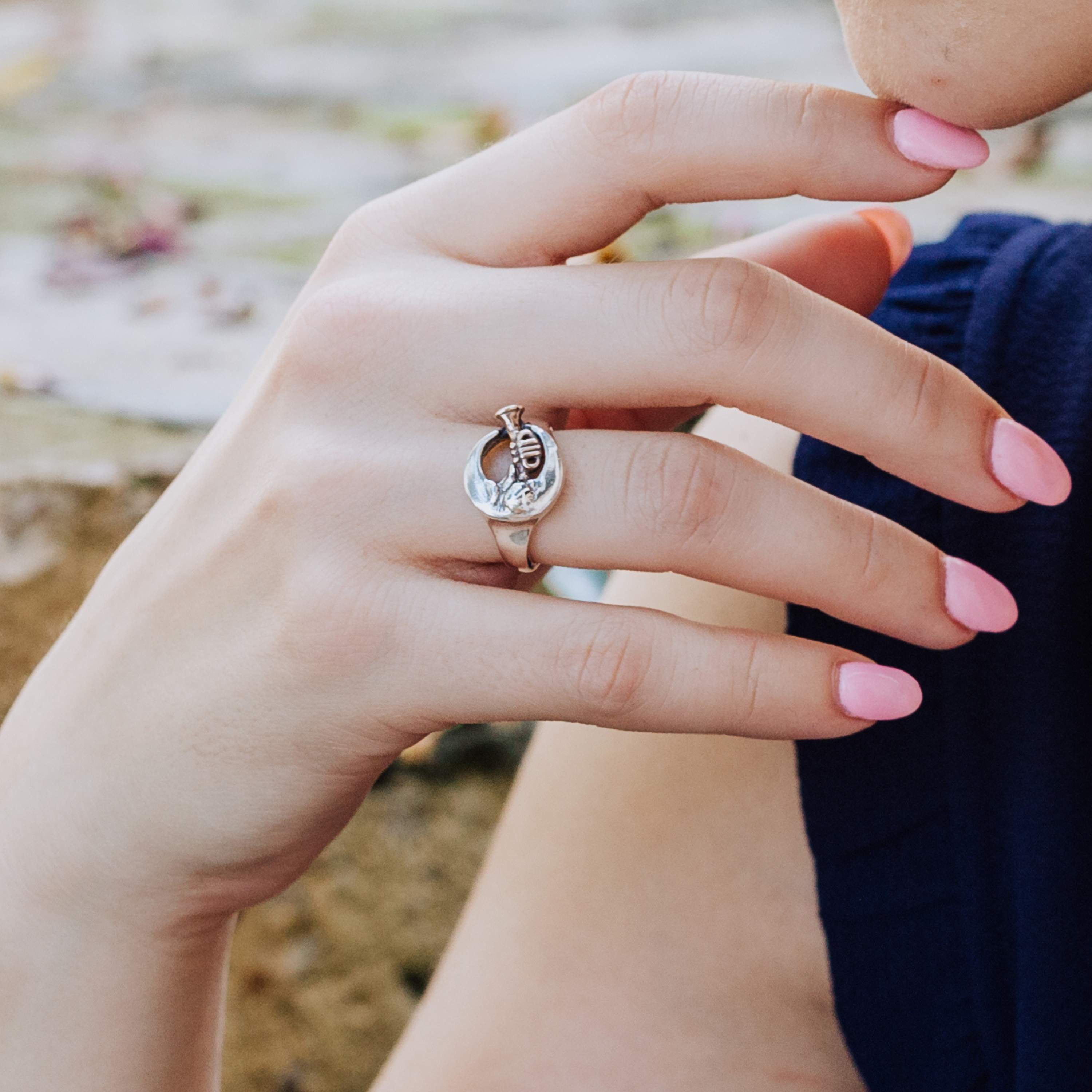 Sterling silver Jazz Man in the Moon ring worn on hand, inspired by New Orleans jazz music