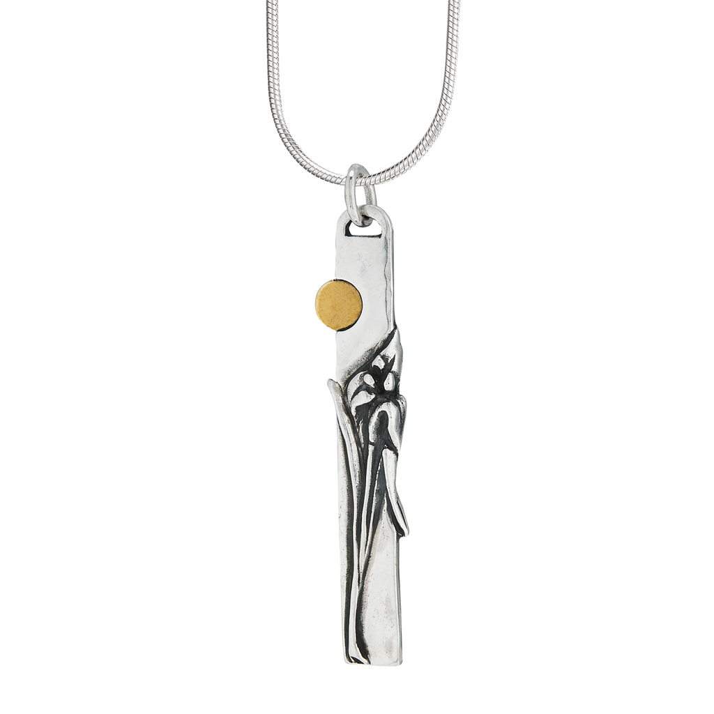 Reverse side of Audubon egret pendant with Louisiana iris design