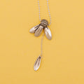 loves me daisy pendant sterling silver with falling petal design