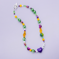 Mardi Gras Throw Necklace with purple green and gold beads inspired by New Orleans parades