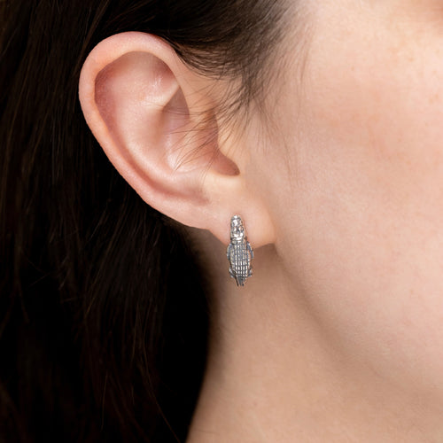 small alligator hoop earrings worn on ear subtle everyday jewelry