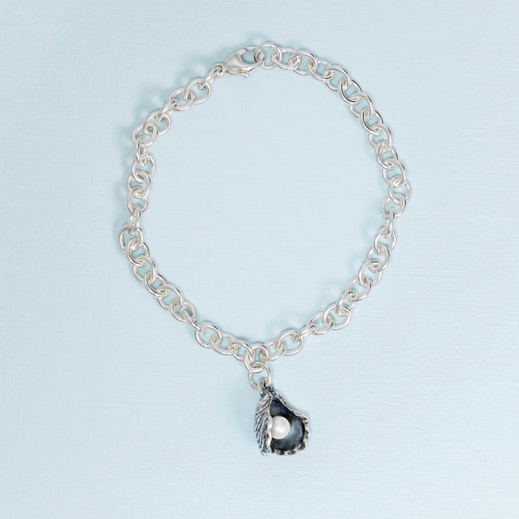 sterling silver oyster pearl bracelet with freshwater pearl charm new orleans jewelry