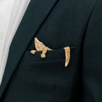 Demonstration of magnetic pocket square insert securing bronze alligator design