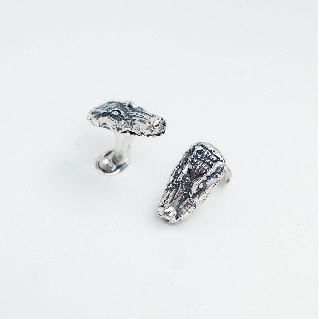 Solid sterling silver alligator cufflinks handcrafted in New Orleans.