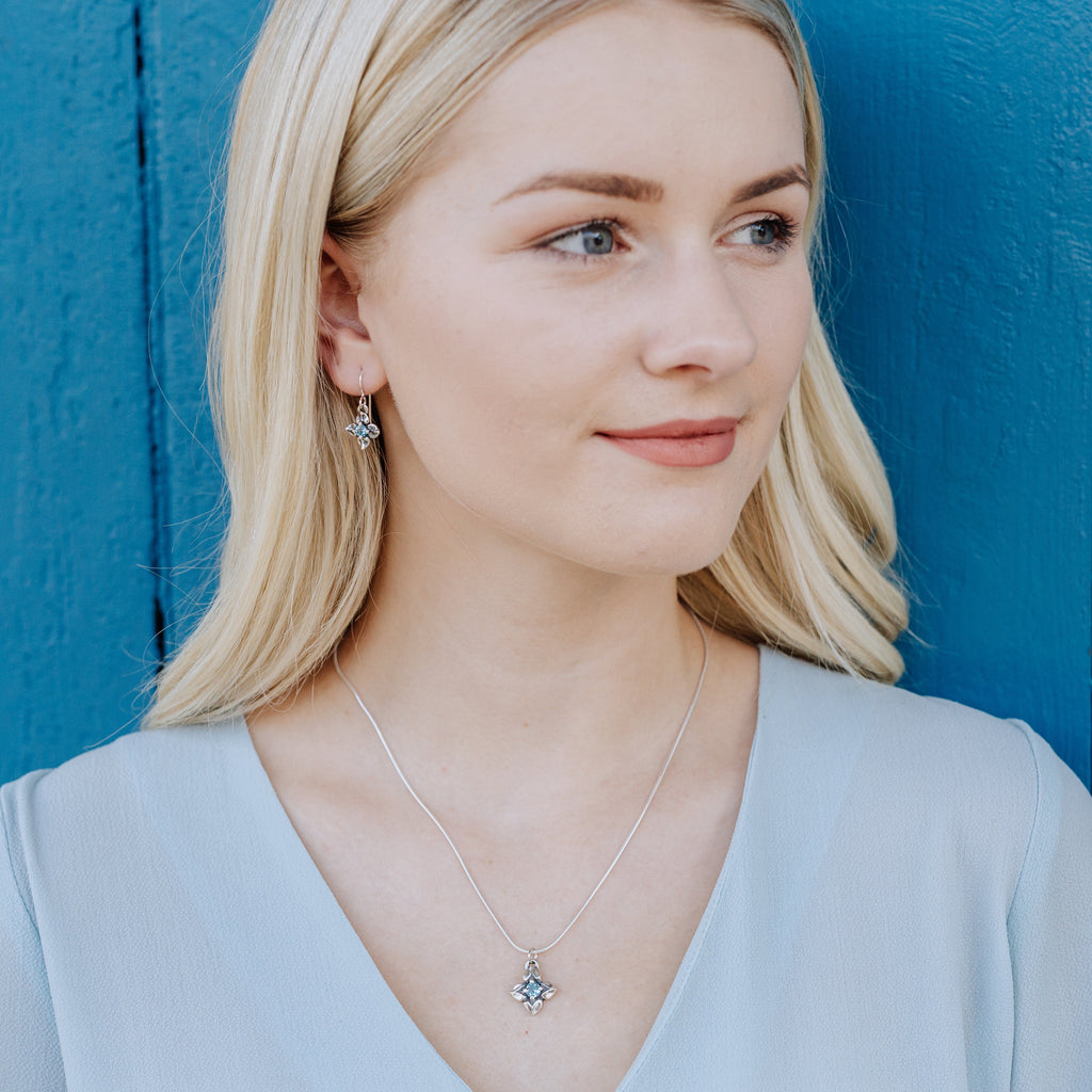 sterling silver flower pendant with swiss blue topaz gemstone spring jewelry