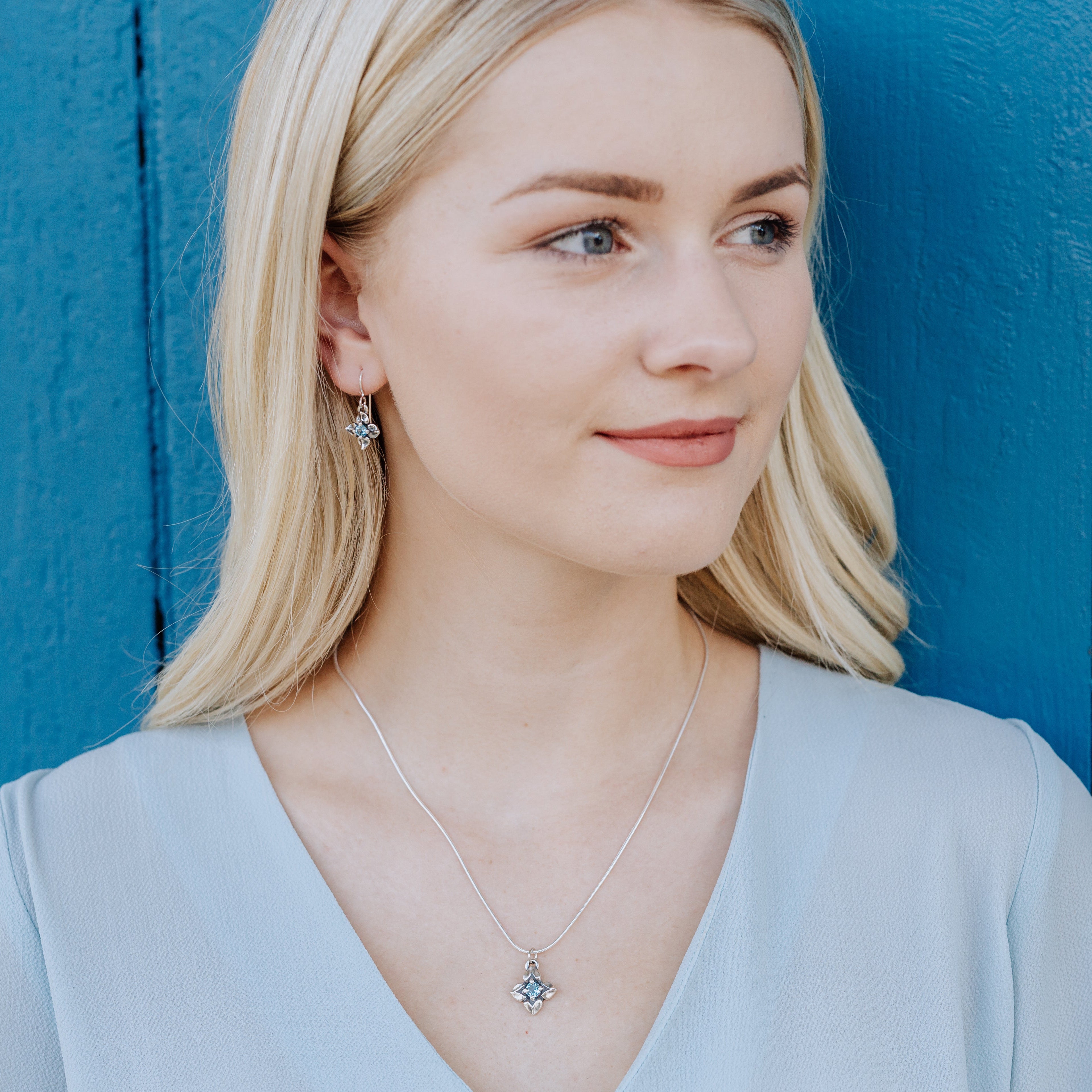 sterling silver flower pendant with swiss blue topaz gemstone spring jewelry