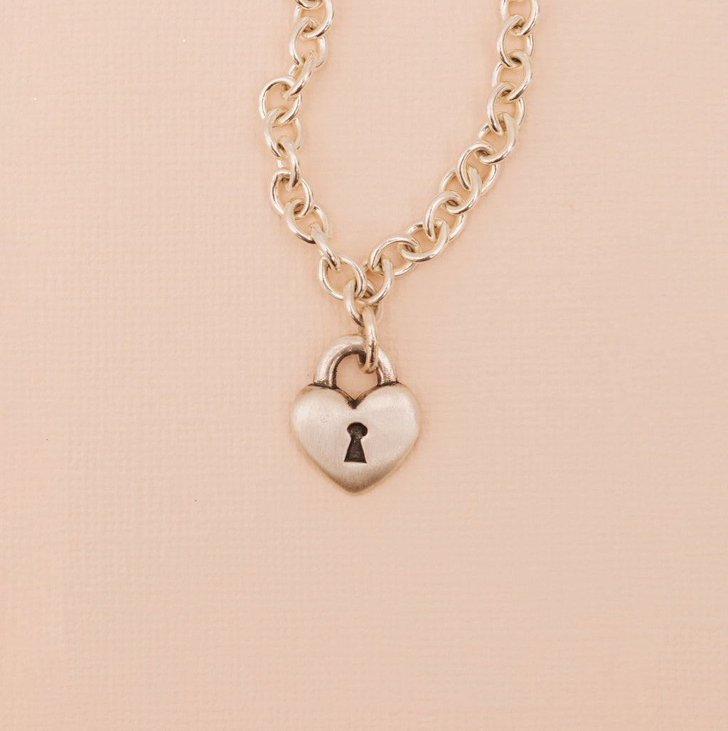 Sterling silver love lock heart chain necklace with keyhole detail front
