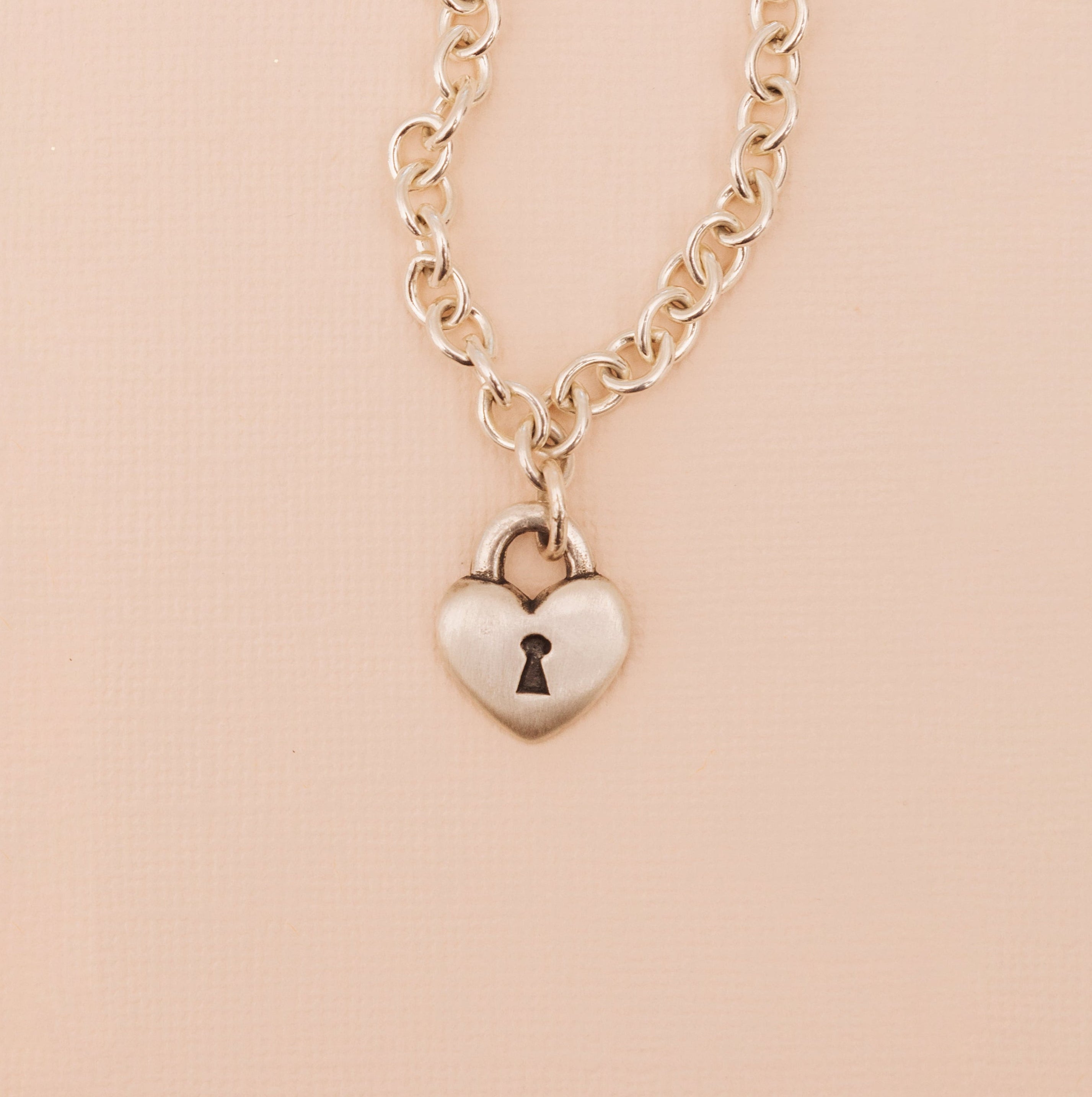 Sterling silver love lock heart chain necklace with keyhole detail front