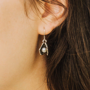 a close up of a woman's ear