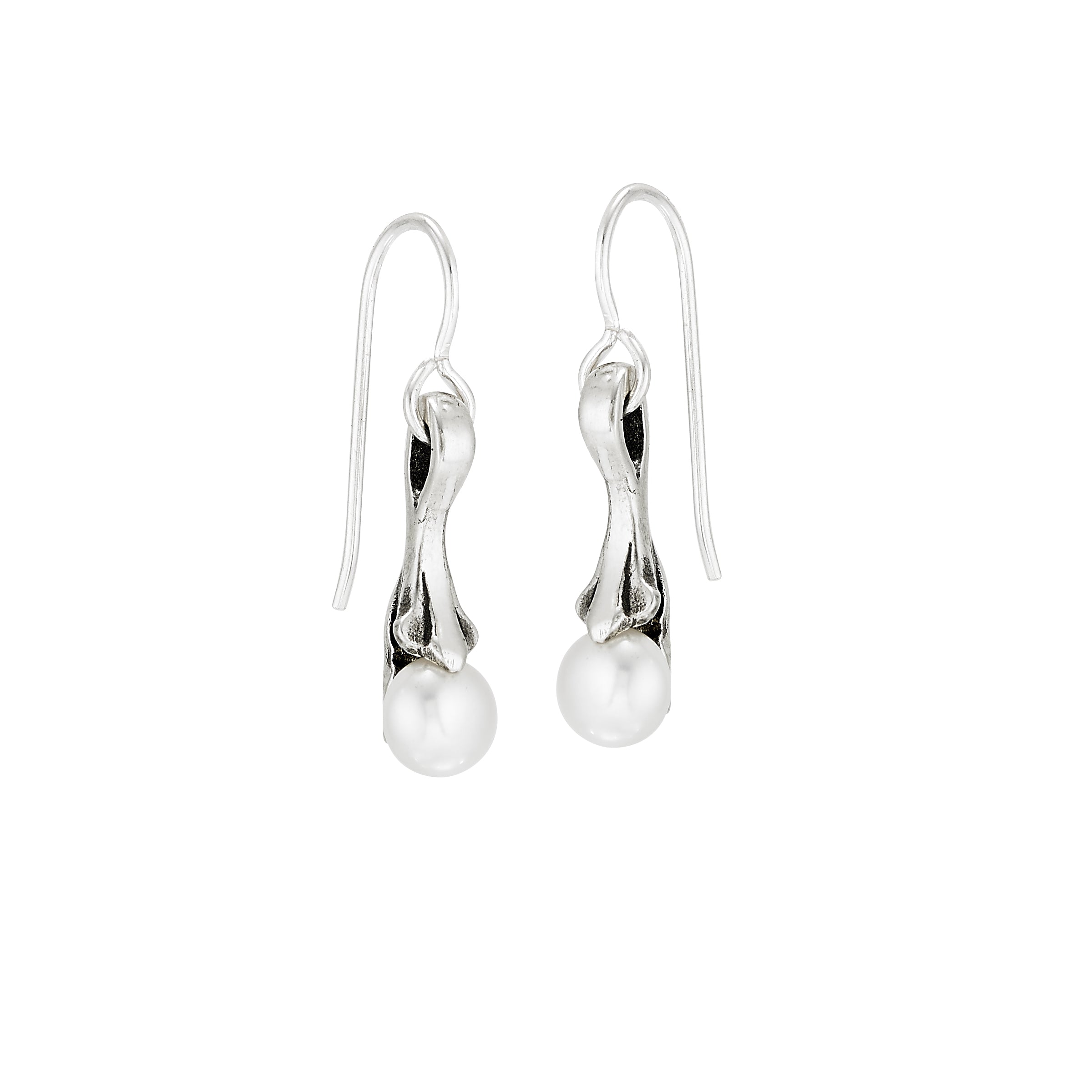 A pair of silver earrings featuring Cultured freshwater pearls, inspired by New Orleans' fleur de lis balconies.