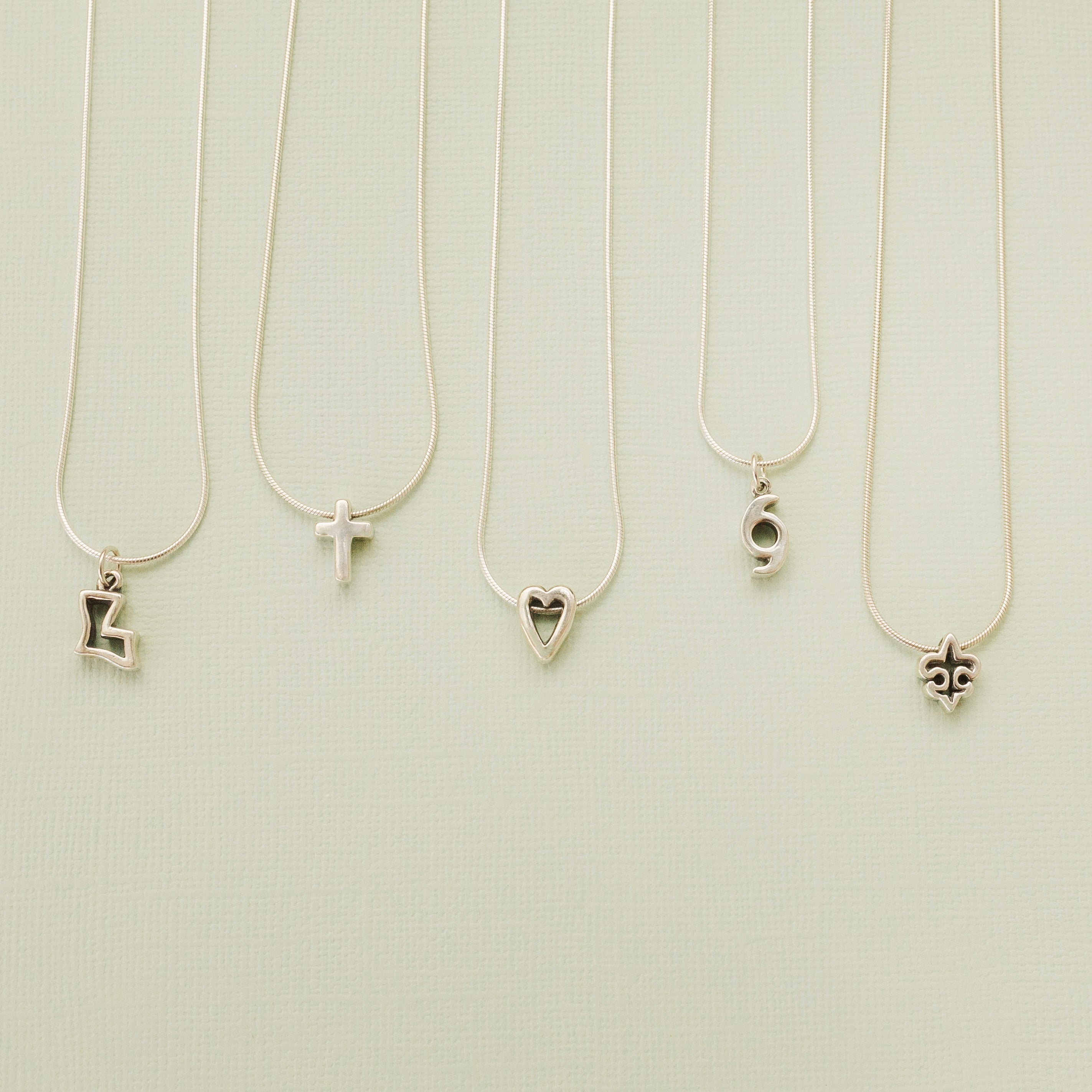 La Petite Cross Pendant