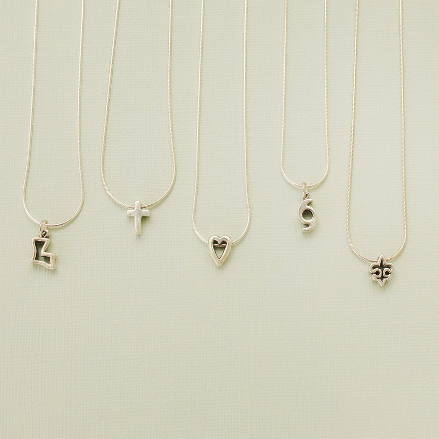 La Petite Cross Pendant