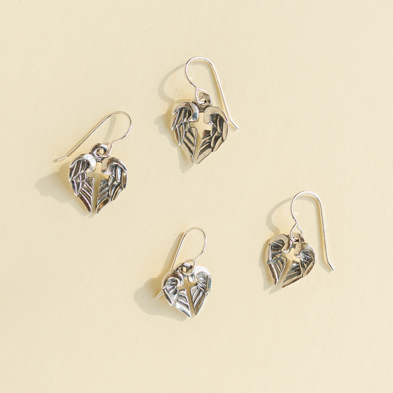 small and large sterling silver angel of hope earrings jewelry set