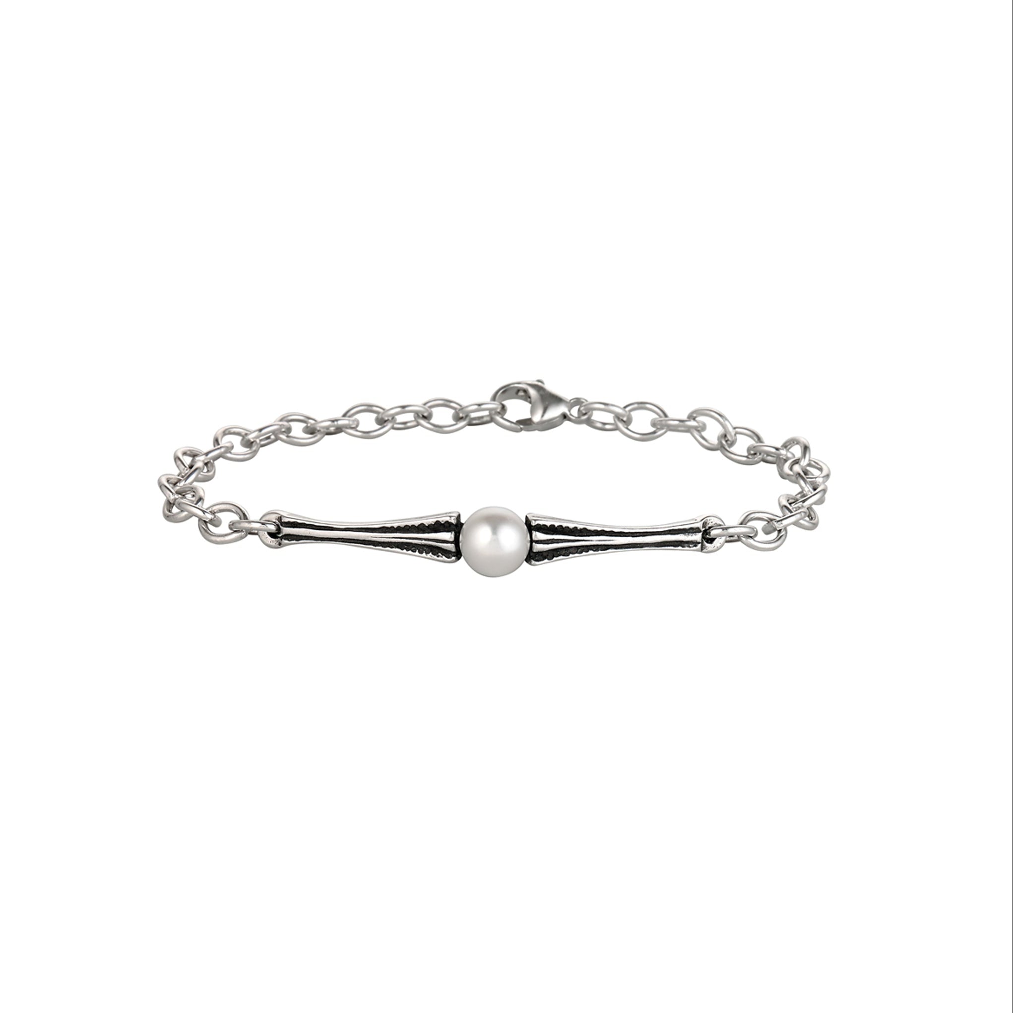 Silver bracelet with a single pearl on a white background
