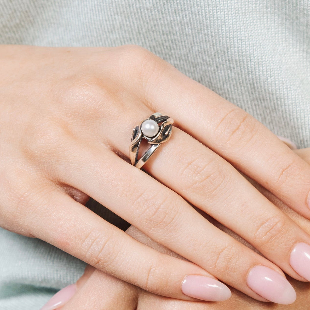 Sterling silver calla lily double pearl ring worn on hand