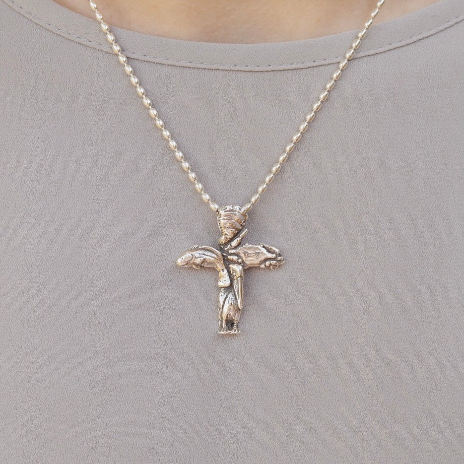 Sterling silver coastal cross pendant inspired by Gulf Coast wildlife