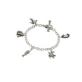 sterling silver coastal charm bracelet with pelican oyster crab turtle and fish charms, handcrafted new orleans jewelry