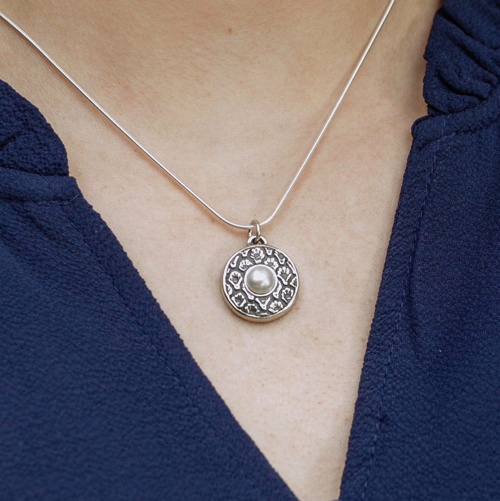 coquille oyster pearl pendant worn on necklace showing size and everyday styling