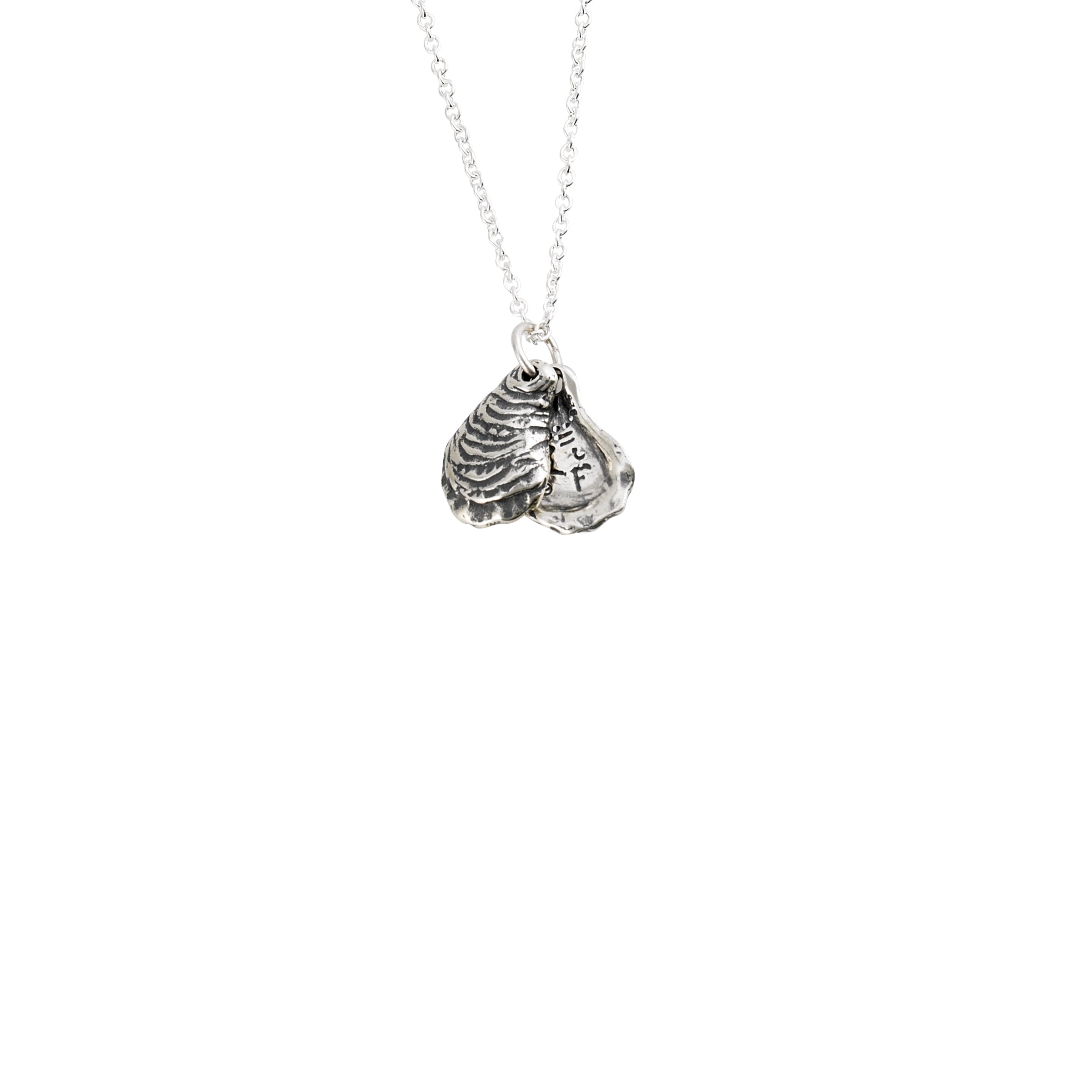 dainty oyster pendant in sterling silver with small double shell design