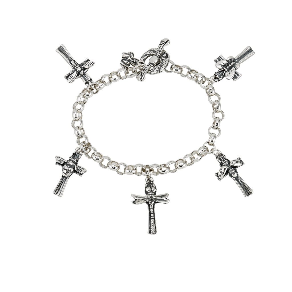 sterling silver insect cross charm bracelet with bumblebee butterfly dragonfly ladybug and cross charms on white background