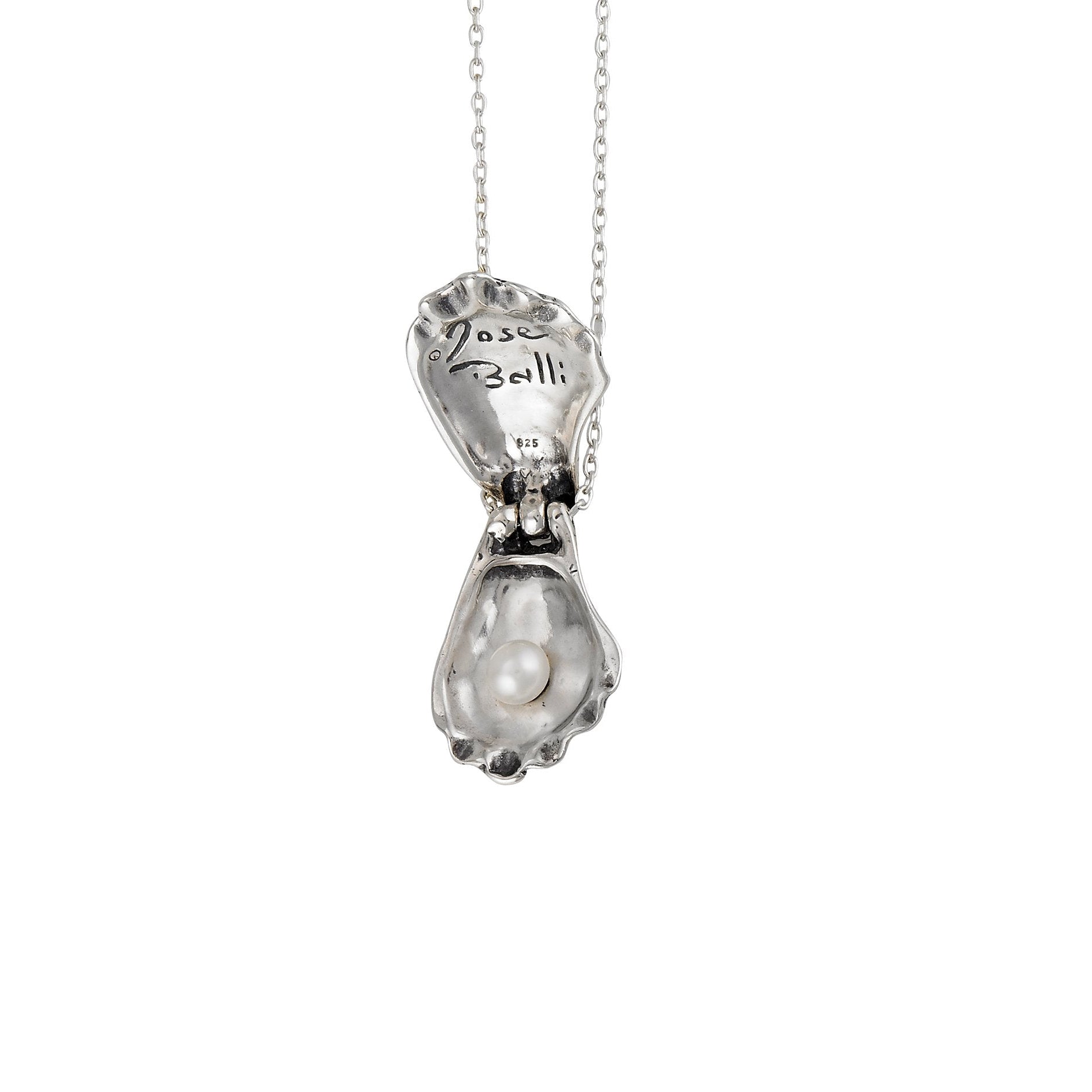 oyster pearl locket necklace open revealing freshwater pearl inside oyster shell