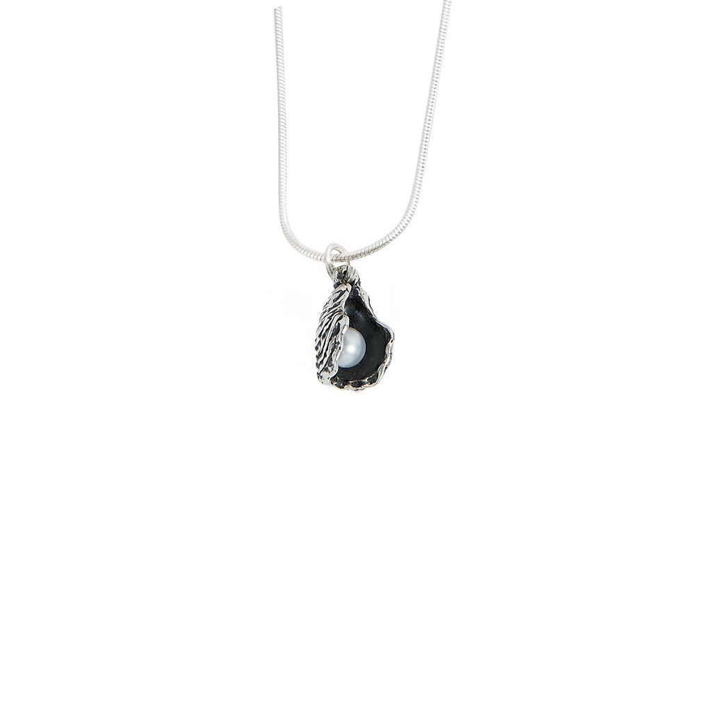 sterling silver oyster pearl pendant with freshwater pearl inside hand carved oyster shell
