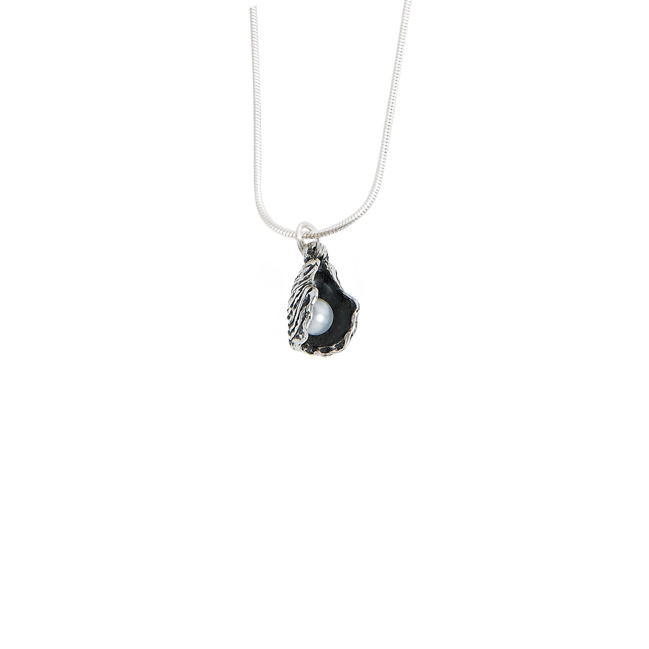 sterling silver oyster pearl pendant with freshwater pearl inside hand carved oyster shell
