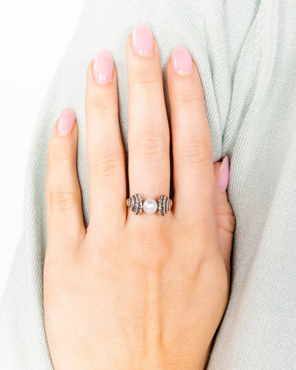 woman wearing oyster pearl ring everyday jewelry new orleans design