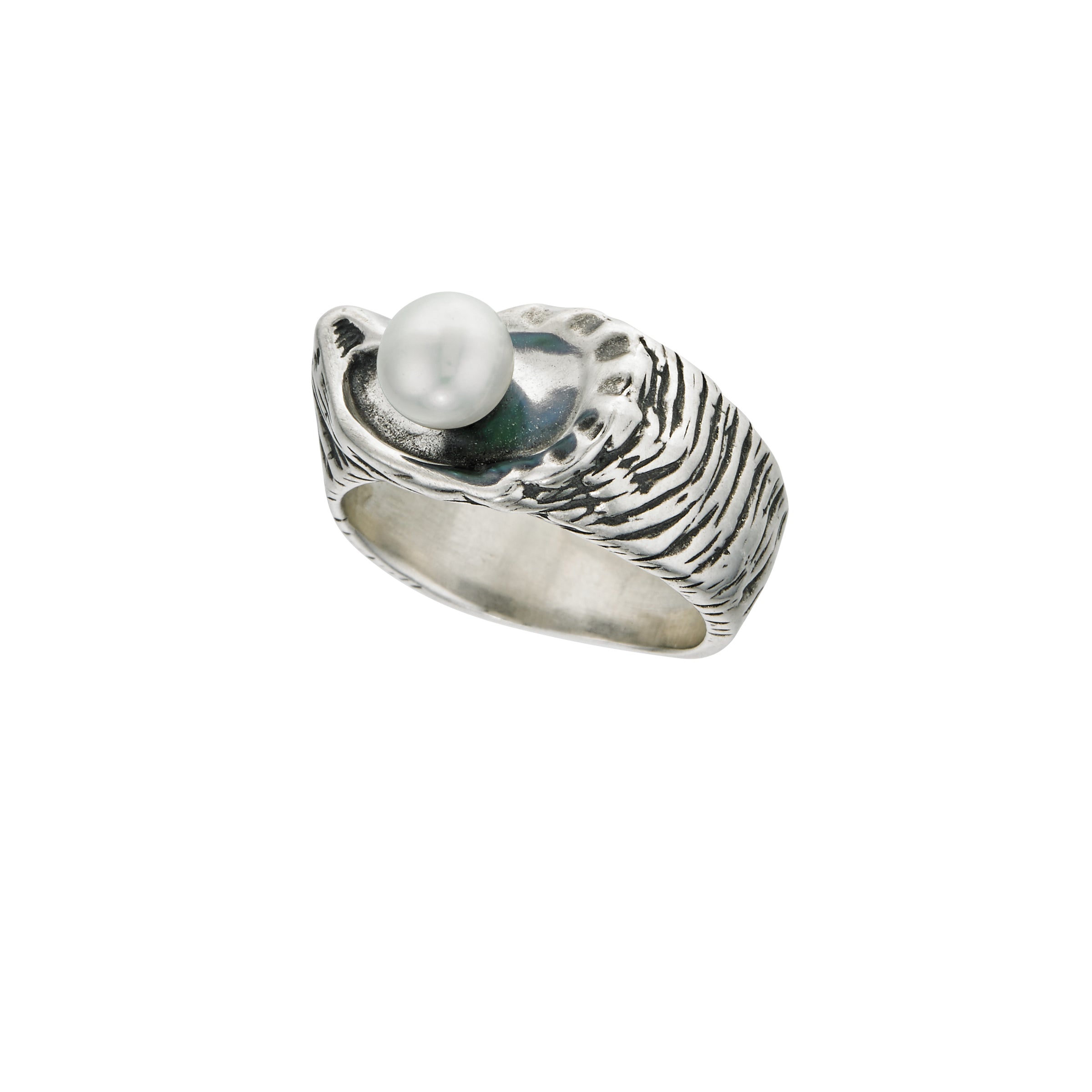 side view of large oyster pearl ring highlighting carved shell texture and elevated pearl