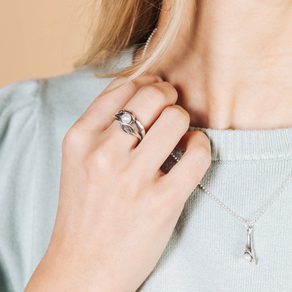 Calla lily double pearl ring handcrafted in sterling silver worn by model