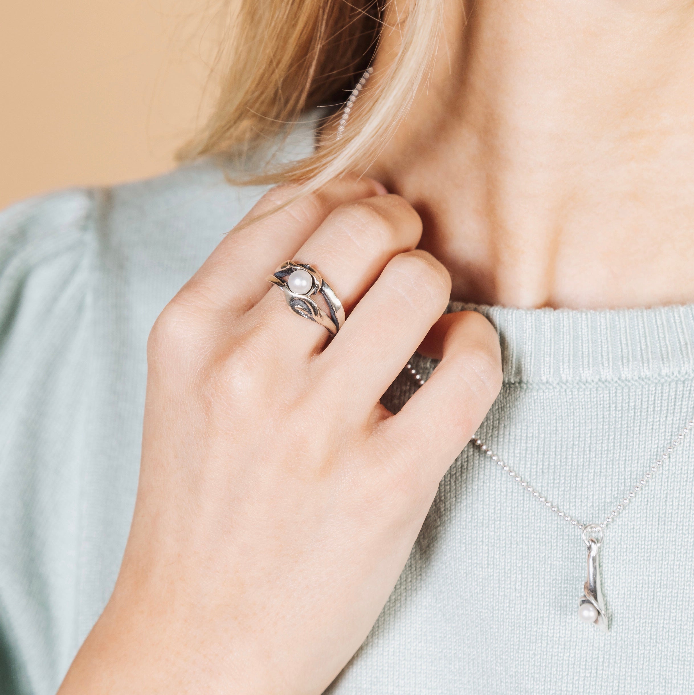Calla lily double pearl ring handcrafted in sterling silver worn by model