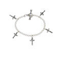 petite sterling silver insect cross charm bracelet with bumblebee butterfly dragonfly and cross charms on white background