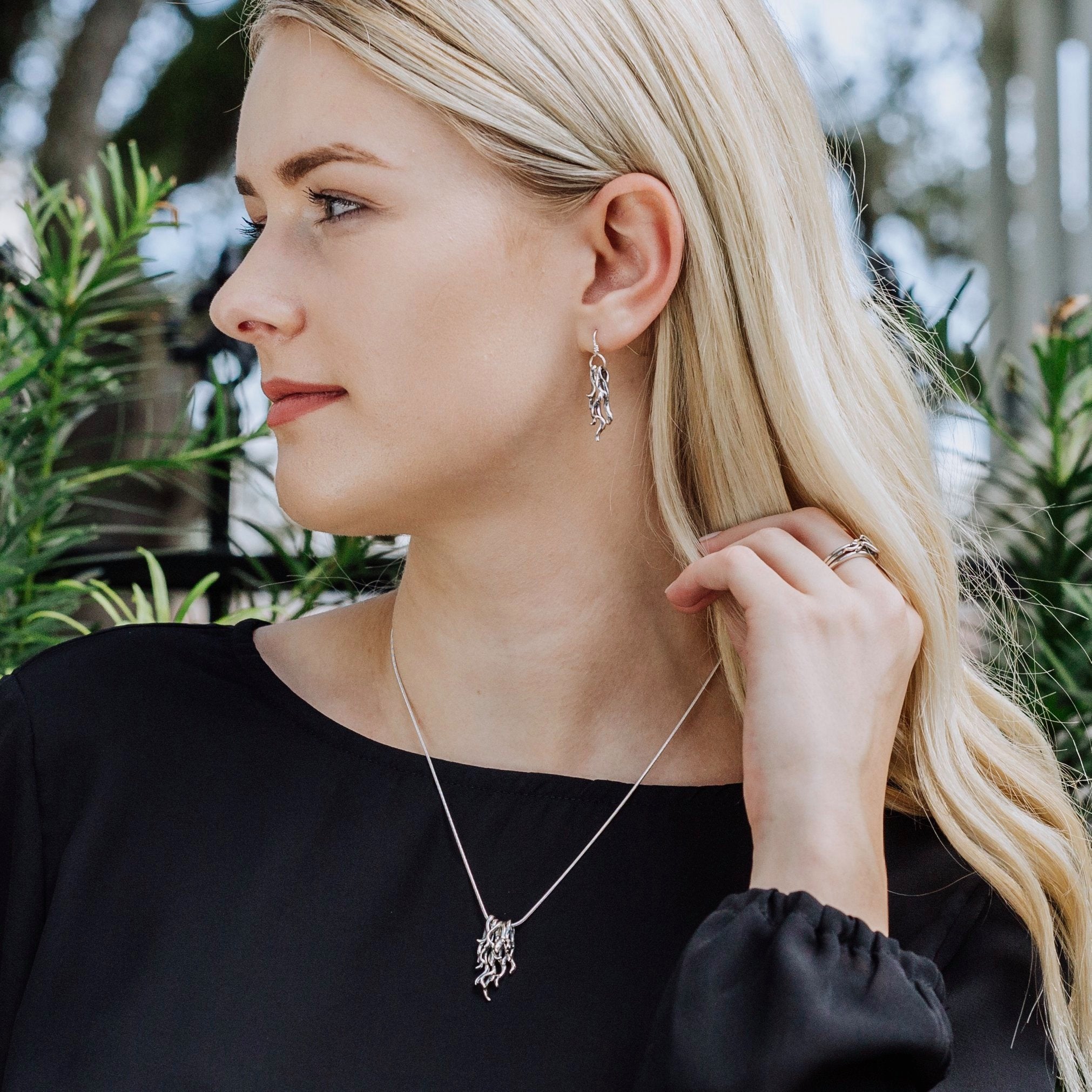 spanish moss earrings worn with matching pendant and ring set