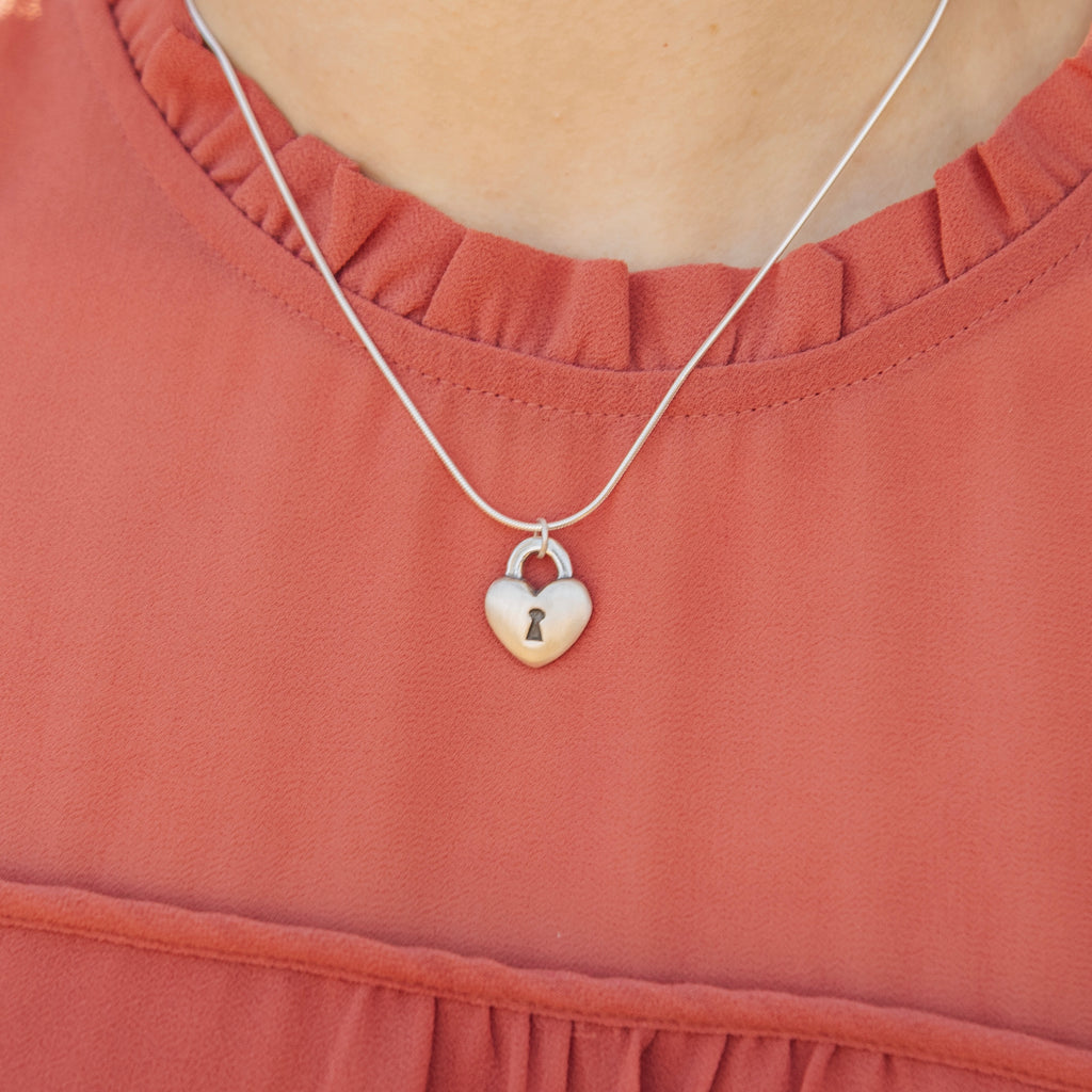 Sterling silver love lock heart pendant worn on chain necklace