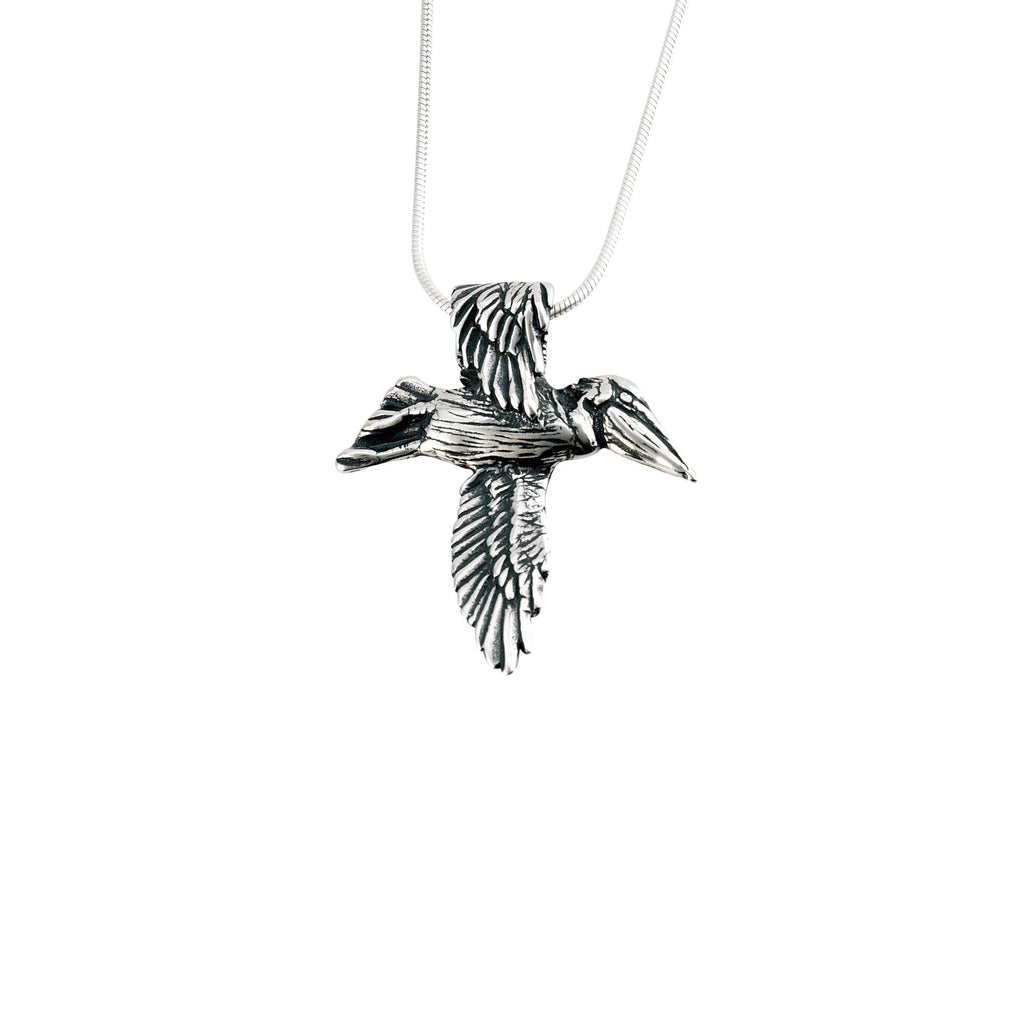 Sterling silver pelican cross pendant necklace designed by Jose Balli